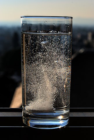 323px-Alka-Seltzer_tablet_dissolving_1.jpg